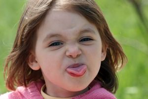 Child Sticking Tongue Out