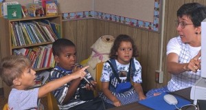 Speech Therapist Working With Children in School