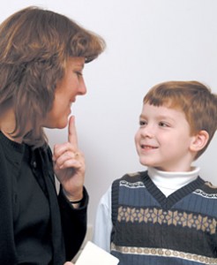 Speech Therapist Working With Child