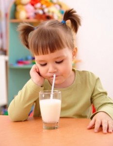 Child Drinking With Straw