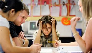 Speech Therapist Working with Child in School