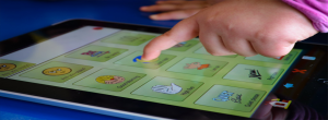Child Using iPad App in Speech Therapy