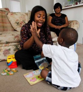 Speech Therapist Giving Child High Five