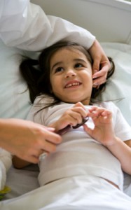 Child in a Hospital Bed