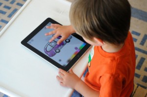 Child Using an iPad App