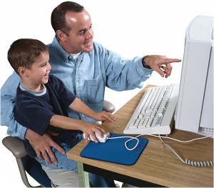Child and Dad Using Commputer