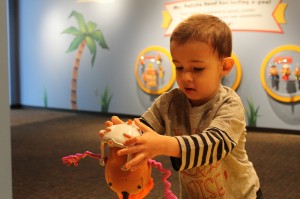 Boy Playing with Mr. Potato Head