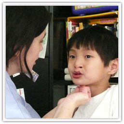 Speech Therapist Working with Child