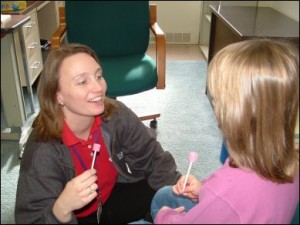 Speech Therapist Working with Child