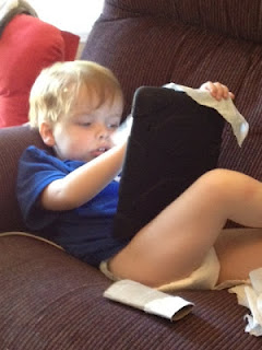 Asa Cleans His iPad