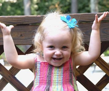 Small Child Using Sign Language