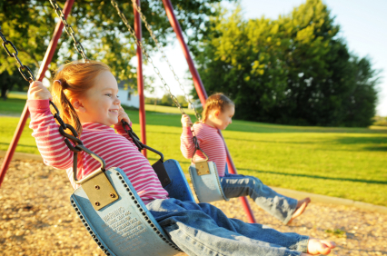 Child on Swingset