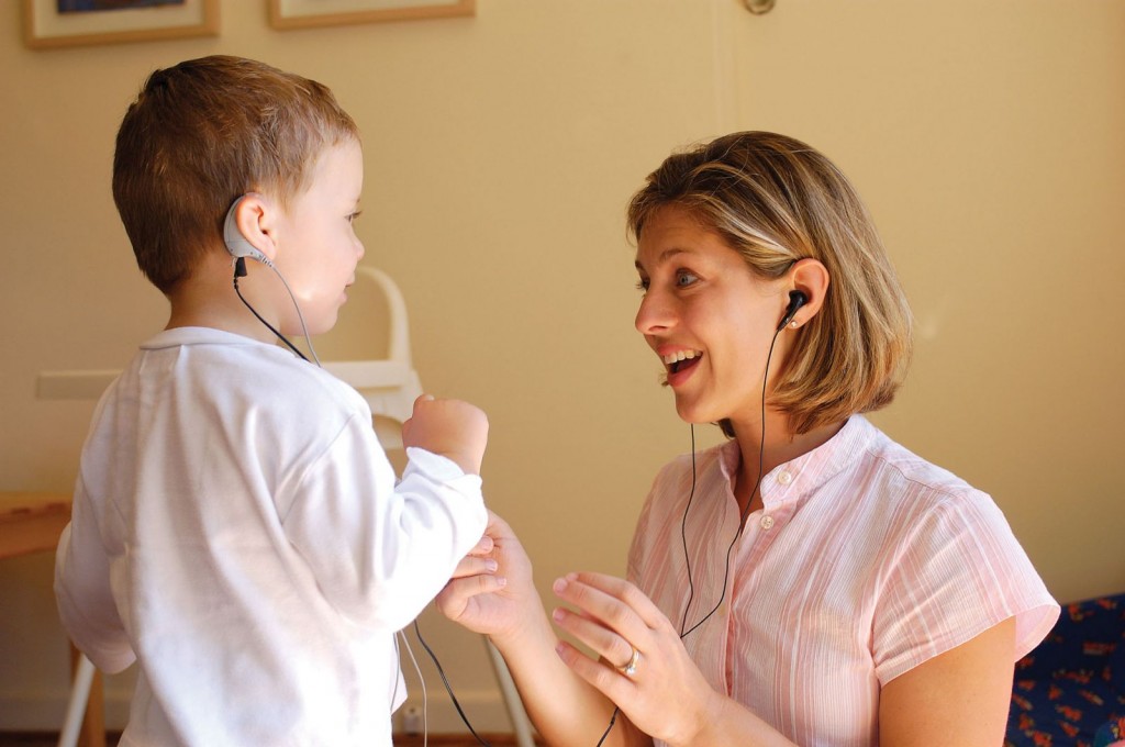 Audiologist and Child with Cochlear Implants