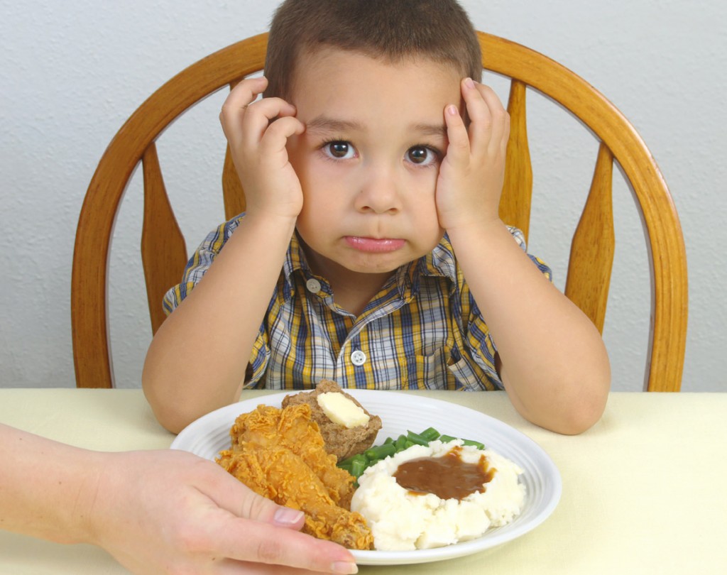 Boy Refusing to Eat Dinner