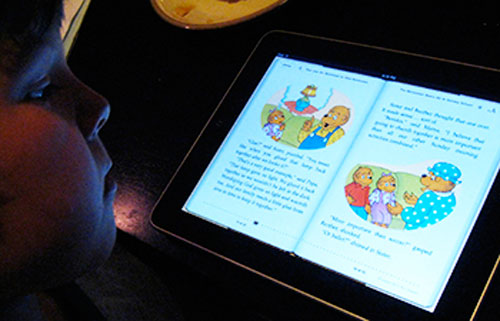 Child reading an ebook 