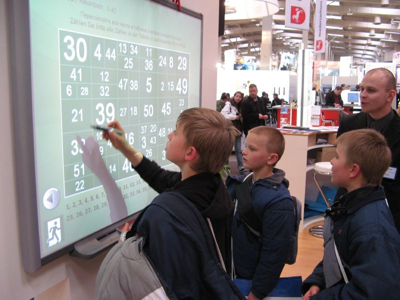students with interactive whiteboard