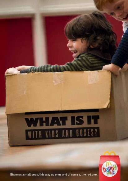 child pretend play in a box from McDonalds ad