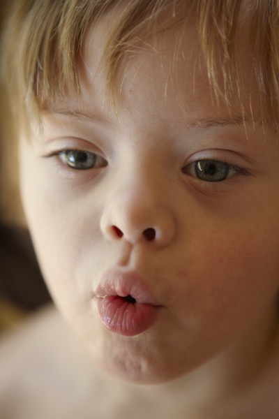 Child pursing lips