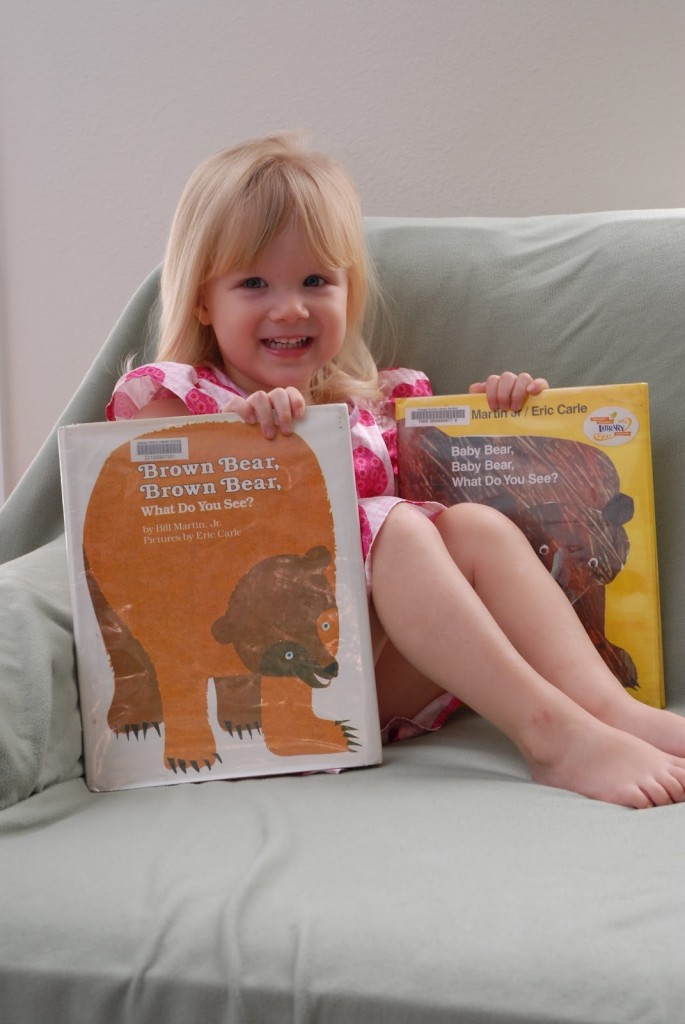 child reading Brown Bear
